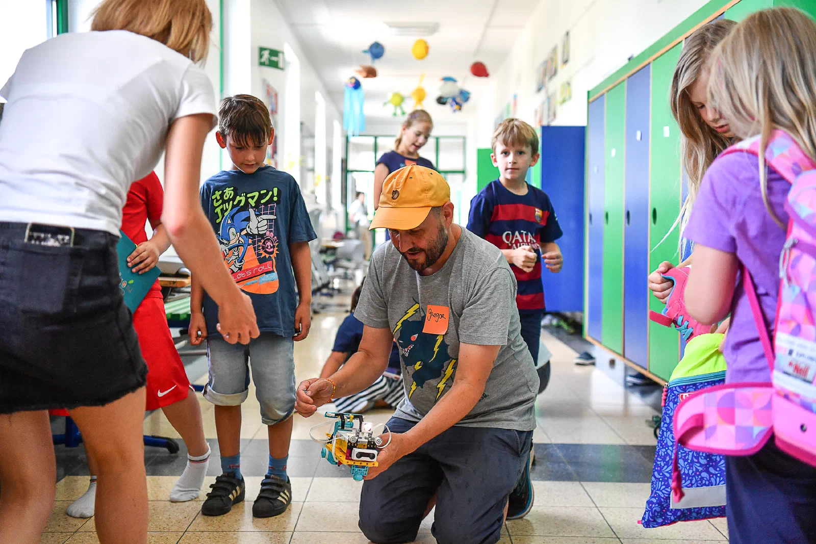 Kids testing their Lego robots on a course during the holiday course